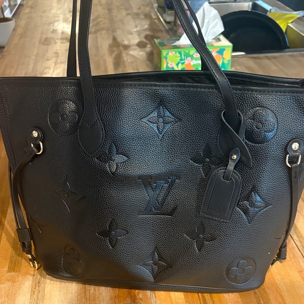 LV black tote never full